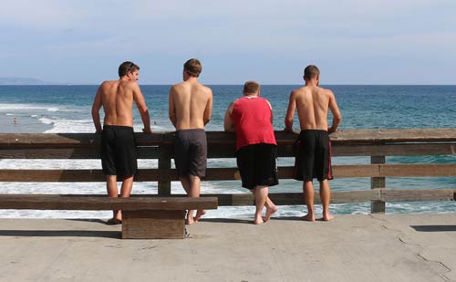 Sober men on Newport Pier in Southern California