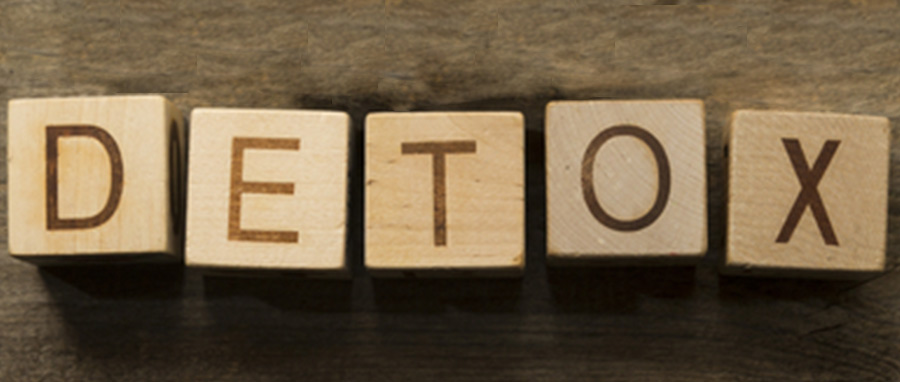 the word detox built with letter blocks