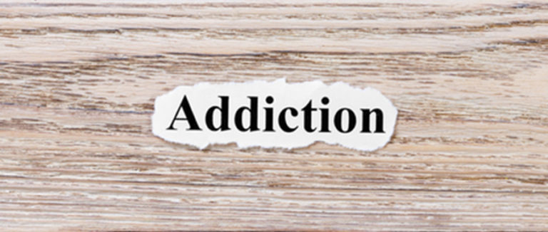 addiction word cut out of book