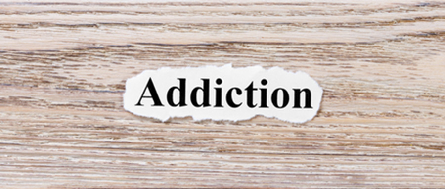 addiction word cut out of book