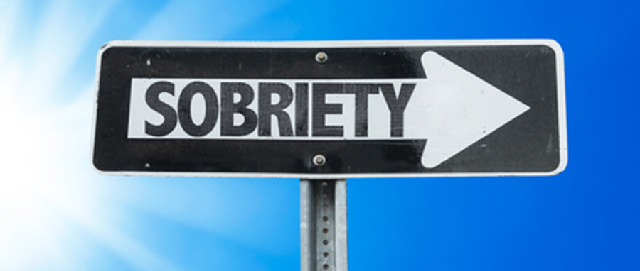 street sign that says sobriety with an arrow